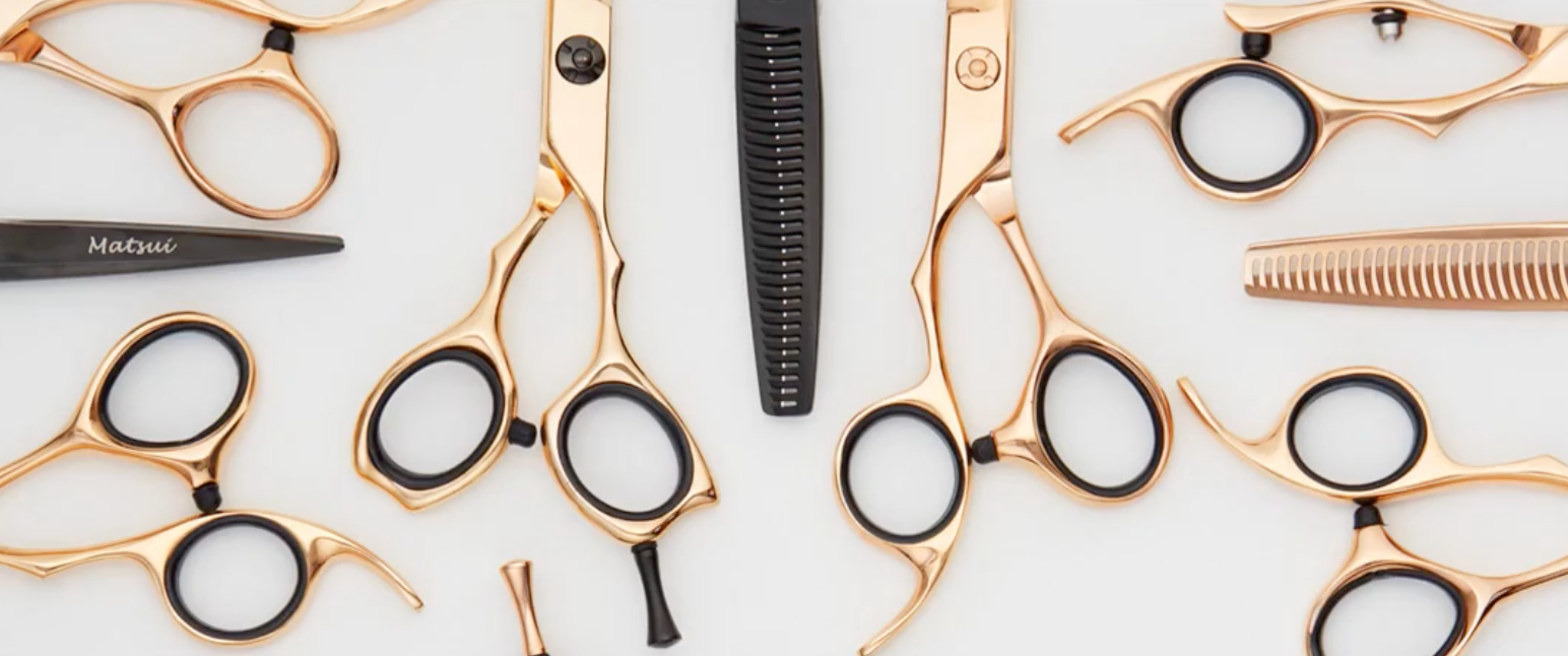 Picture of hairdressing scissors on black background - Cast Shears vs Forged Shears